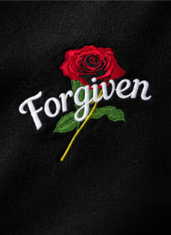 Forgiven hoodie front embroidery studio close-up